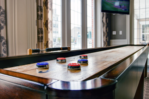 Shuffle board table at Creekstone Village apartments in Pasadena, MD