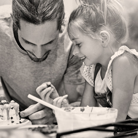 Dad and daughter cooking | Creekstone Village