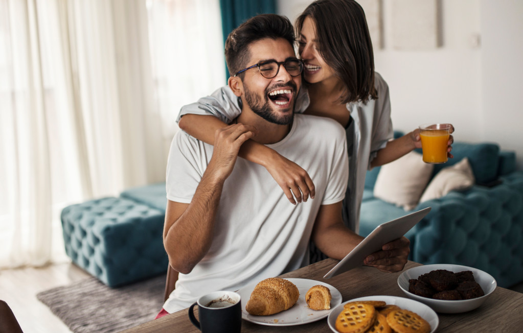 Couple smiling having breakfast | Creekstone Village