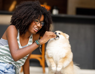 Woman with dog | Creekstone Village